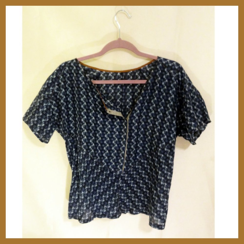 Anthropologie silk shirt with asymmetrical detail